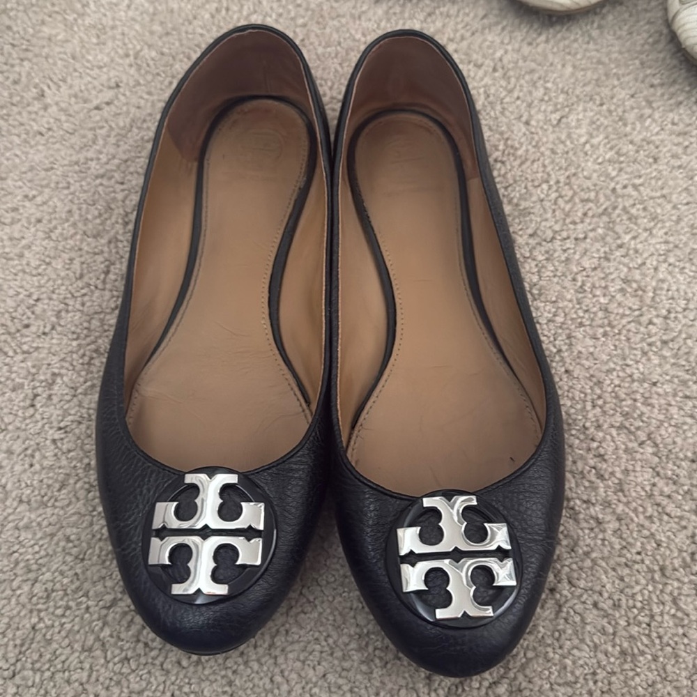 Black Tory Burch flats with silver emblem size 9